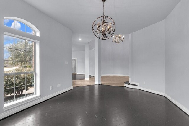 13811 Sugar Dock Ct, Houston, TX 77044 - empty room with wood finished floors, a chandelier, and recessed lighting