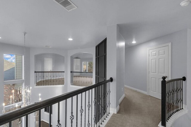 13811 Sugar Dock Ct, Houston, TX 77044 - corridor featuring an upstairs landing, carpet flooring, recessed lighting, and a chandelier