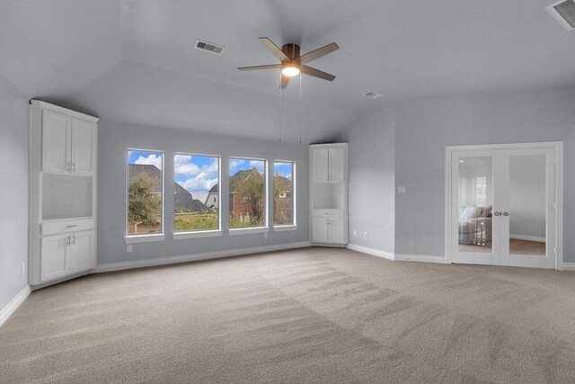 13811 Sugar Dock Ct, Houston, TX 77044 - unfurnished bedroom featuring vaulted ceiling, carpet, french doors, and a ceiling fan