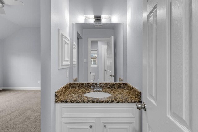 13811 Sugar Dock Ct, Houston, TX 77044 - bathroom featuring vanity and vaulted ceiling