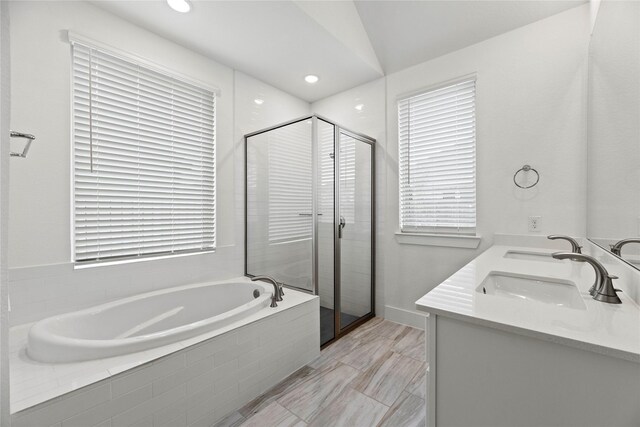 18402 Mesquite Flats Trl, Cypress, TX 77433 - full bathroom featuring a shower stall, a bath, double vanity, recessed lighting, and healthy amount of natural light