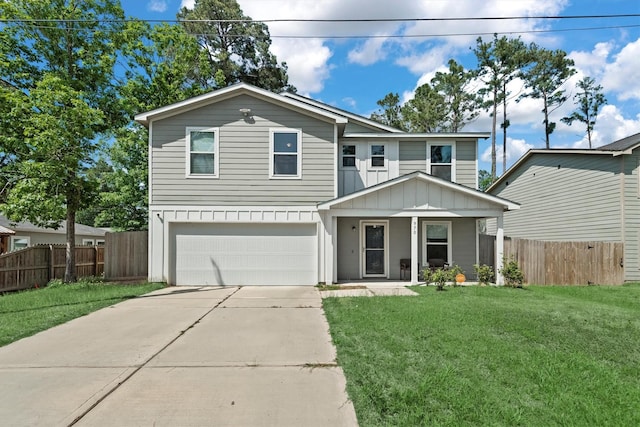 view of front of property with an attached garage, concrete driveway, a front yard, and fence