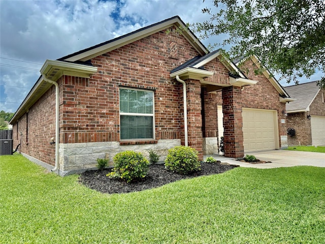 ranch-style home featuring an attached garage, brick siding, driveway, and a front yard
