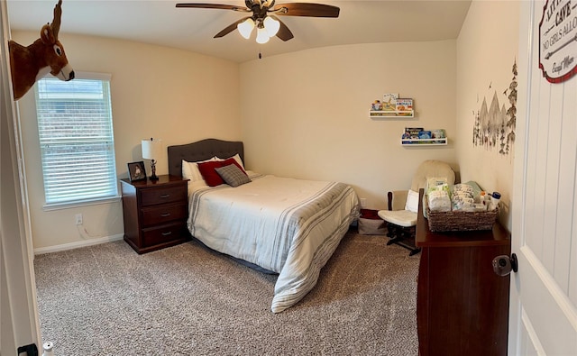bedroom featuring a ceiling fan, baseboards, and carpet floors