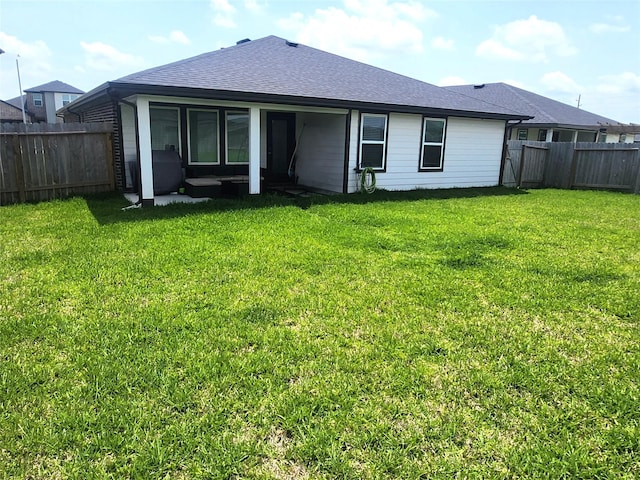 30042 Ousel Falls Ln, Katy, TX 77494 - back of property with a shingled roof and a sunroom