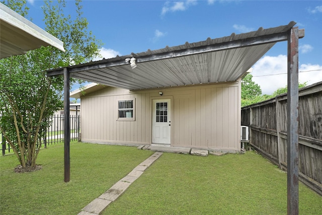 view of outbuilding with a fenced backyard