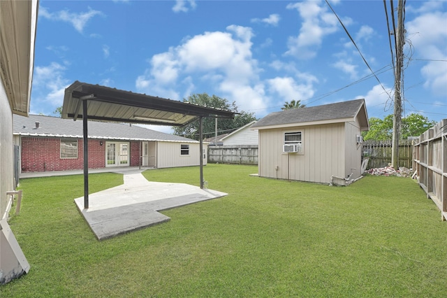 view of yard with a storage shed, a fenced backyard, cooling unit, an outdoor structure, and a patio