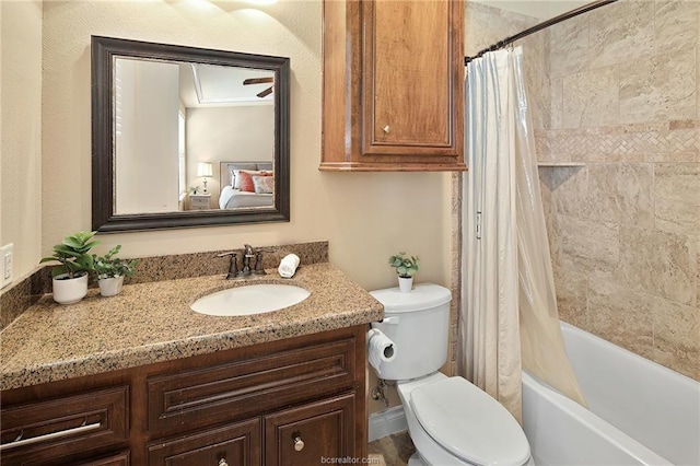 bathroom with shower / tub combo, toilet, and vanity