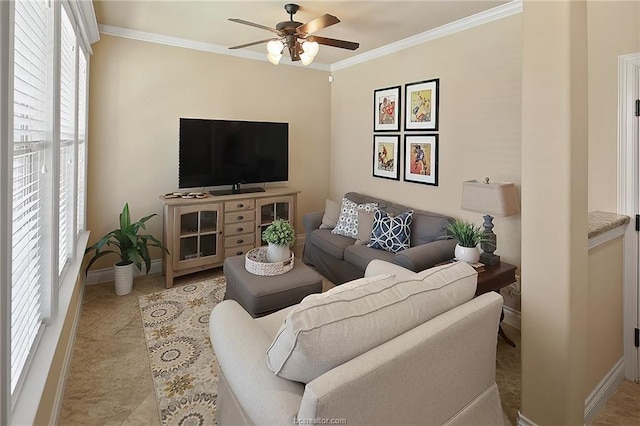 living room featuring crown molding, a ceiling fan, and baseboards