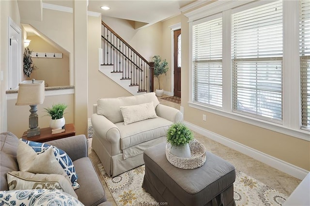 tiled living area featuring recessed lighting, stairway, and baseboards