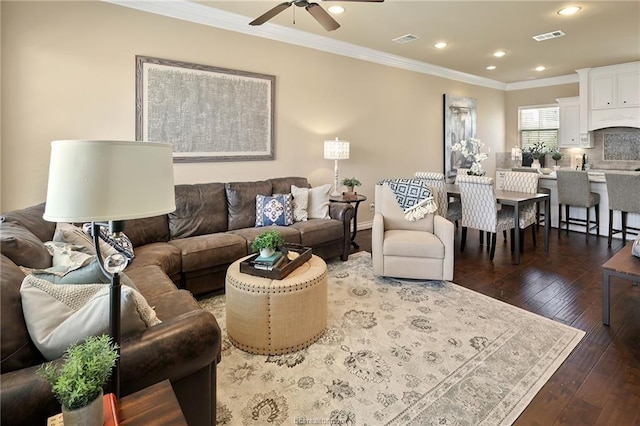 living room with recessed lighting, hardwood / wood-style floors, visible vents, crown molding, and ceiling fan