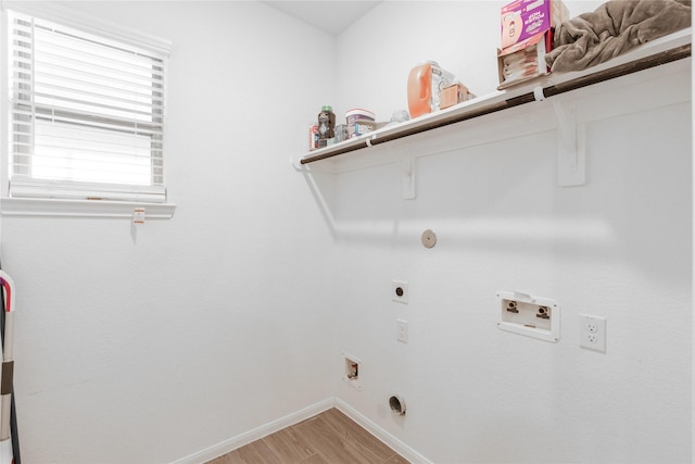 laundry room featuring hookup for an electric dryer, light wood-type flooring, baseboards, washer hookup, and laundry area