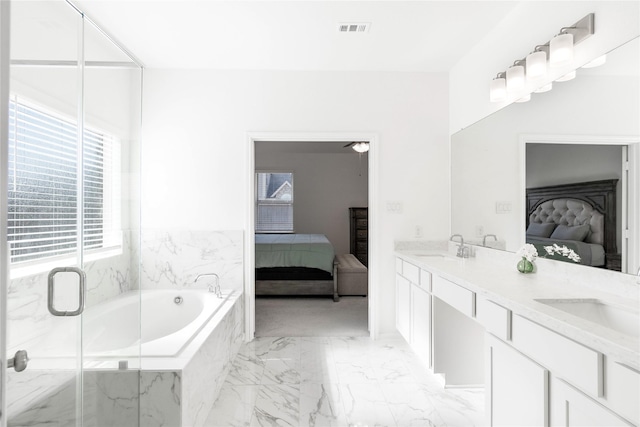 ensuite bathroom featuring ensuite bathroom, marble finish floor, and a sink