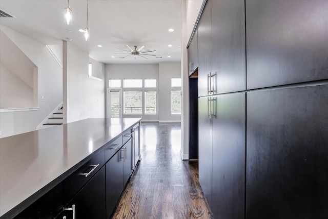 kitchen with recessed lighting, dark wood finished floors, visible vents, a ceiling fan, and pendant lighting