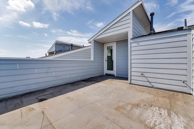 view of patio / terrace featuring fence