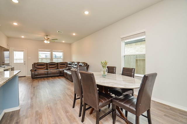 dining room featuring ceiling fan, light wood-style floors, recessed lighting, baseboards, and visible vents