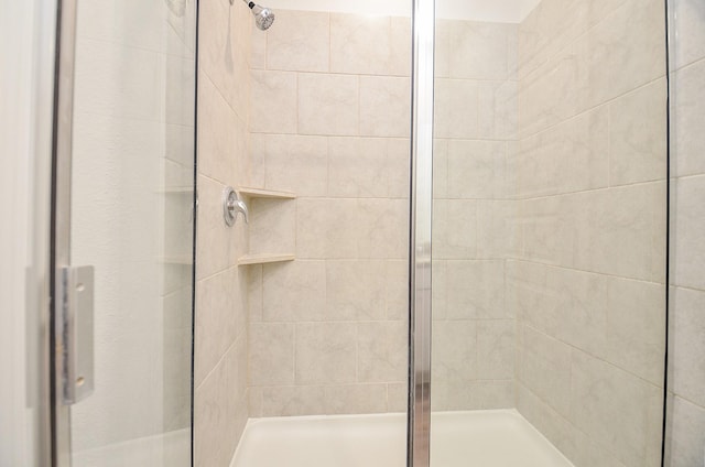 bathroom featuring a stall shower
