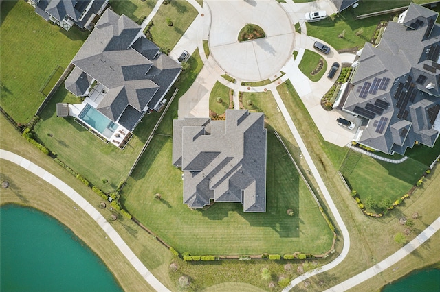 aerial view with a water view and a residential view
