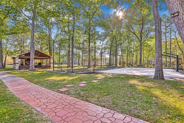 view of community featuring a gazebo and a yard