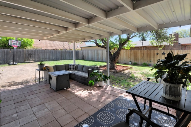 view of patio featuring a fenced backyard and outdoor dining area