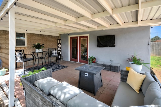 view of patio / terrace featuring an outdoor living space and french doors