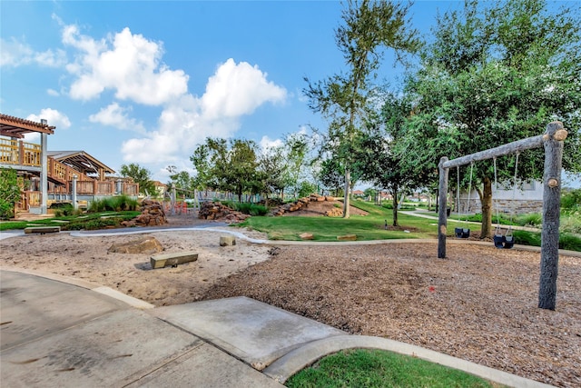 view of home's community with a lawn