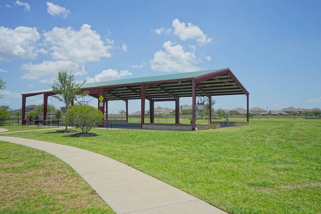 view of home's community featuring a lawn