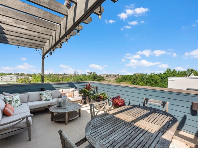 view of patio / terrace with a pergola and outdoor lounge area