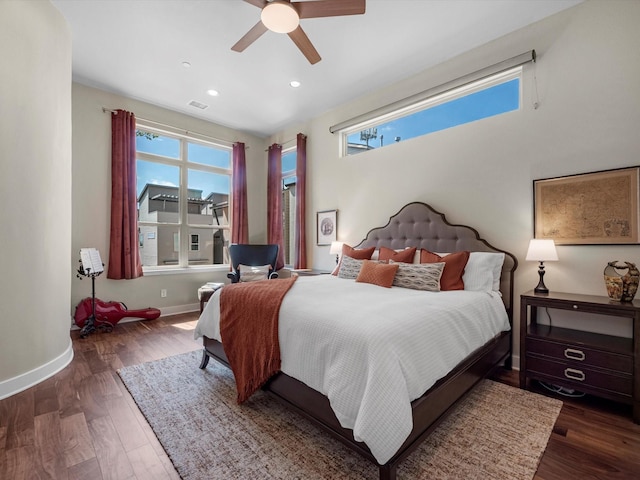 bedroom featuring recessed lighting, wood finished floors, visible vents, and baseboards