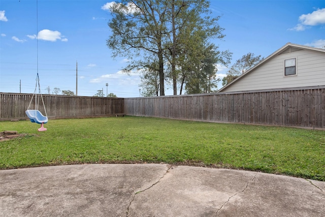 view of yard featuring a fenced backyard and a patio