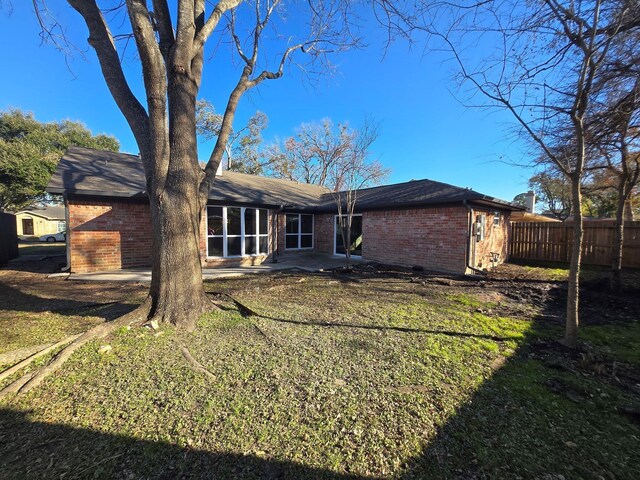 1403 Hitherfield Dr, Sugar Land, TX 77498 - back of property featuring brick siding