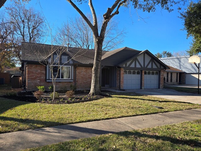 1403 Hitherfield Dr, Sugar Land, TX 77498 - tudor home featuring an attached garage, brick siding, cooling unit, a front yard, and concrete driveway