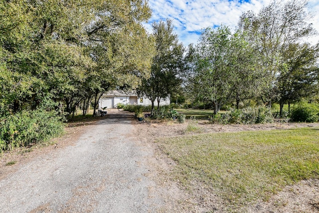 view of road featuring driveway