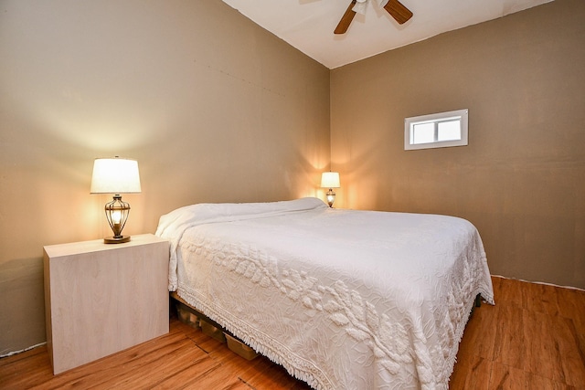 bedroom with wood finished floors and ceiling fan