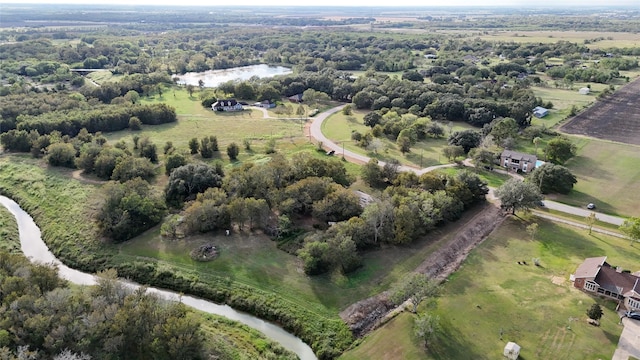 birds eye view of property with a rural view