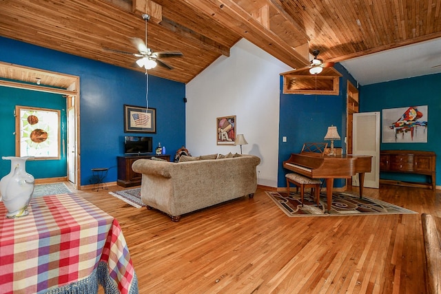 living area featuring wood ceiling, ceiling fan, and vaulted ceiling with beams