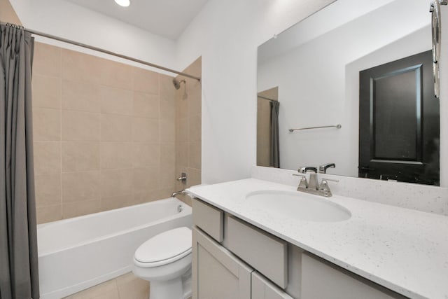 30706 Thicket Ct, Fulshear, TX 77441 - full bathroom featuring shower / bath combo with shower curtain, toilet, vanity, and tile patterned floors