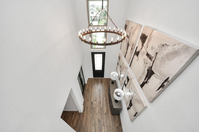 30706 Thicket Ct, Fulshear, TX 77441 - entryway with baseboards, a towering ceiling, an inviting chandelier, and dark wood finished floors