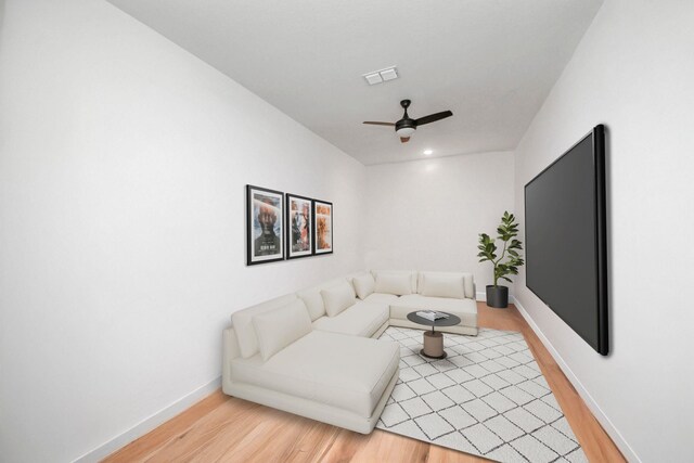 30706 Thicket Ct, Fulshear, TX 77441 - living room with baseboards, wood finished floors, visible vents, and ceiling fan