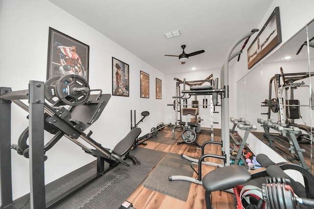 30706 Thicket Ct, Fulshear, TX 77441 - exercise room featuring wood finished floors, visible vents, and a ceiling fan