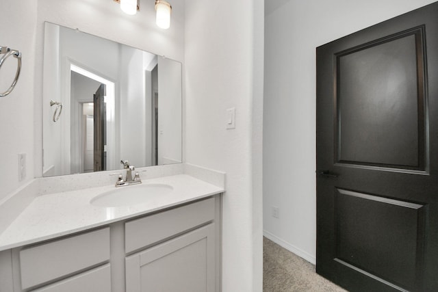 30706 Thicket Ct, Fulshear, TX 77441 - bathroom featuring baseboards and vanity