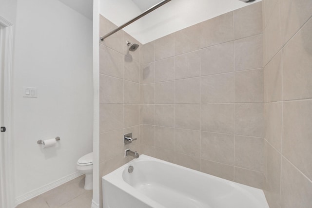 30706 Thicket Ct, Fulshear, TX 77441 - full bath with tile patterned floors, baseboards, tub / shower combination, and toilet
