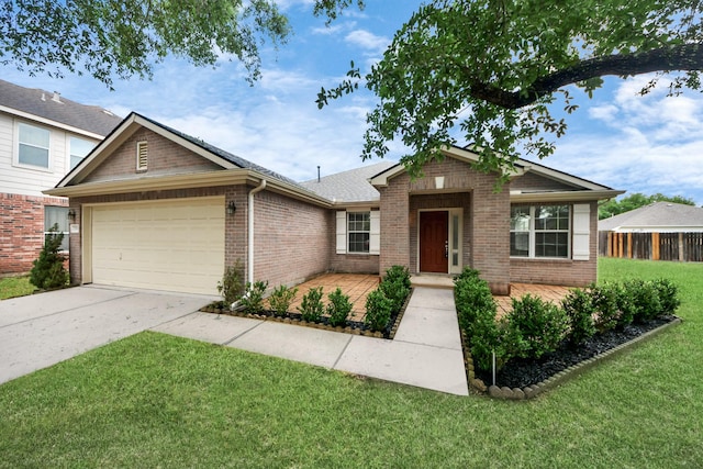 ranch-style home with fence, driveway, brick siding, a front yard, and a garage