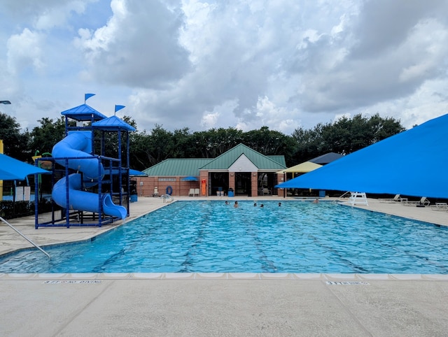 21510 Tallow Grove Ln, Katy, TX 77450 - community pool with a water slide and a patio