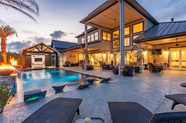 outdoor pool featuring a patio area, an outdoor hangout area, a ceiling fan, and outdoor dining space