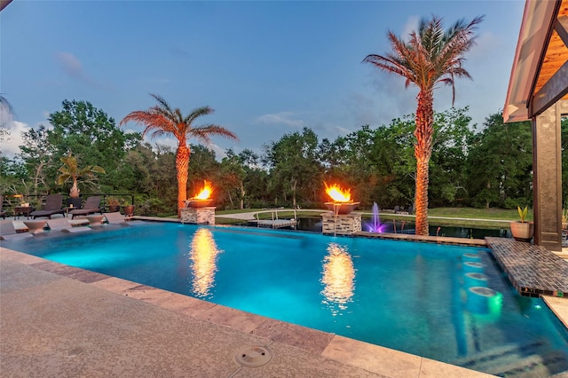 pool featuring a patio area
