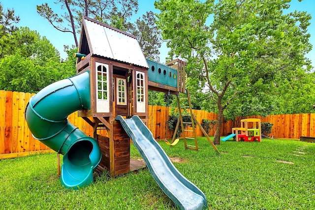 16611 River Wood Ct, Crosby, TX 77532 - view of jungle gym with a lawn and a fenced backyard