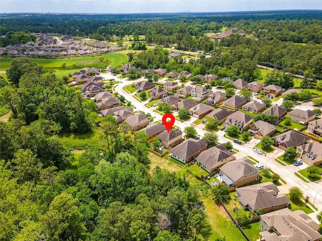 16611 River Wood Ct, Crosby, TX 77532 - bird's eye view featuring a wooded view and a residential view