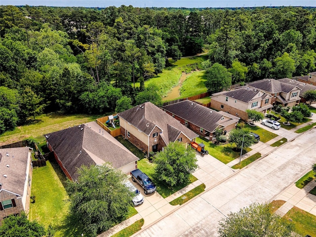 16611 River Wood Ct, Crosby, TX 77532 - bird's eye view featuring a residential view and a wooded view