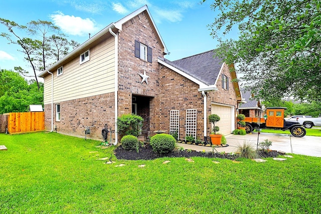 16611 River Wood Ct, Crosby, TX 77532 - view of home's exterior featuring a garage, a lawn, driveway, brick siding, and fence